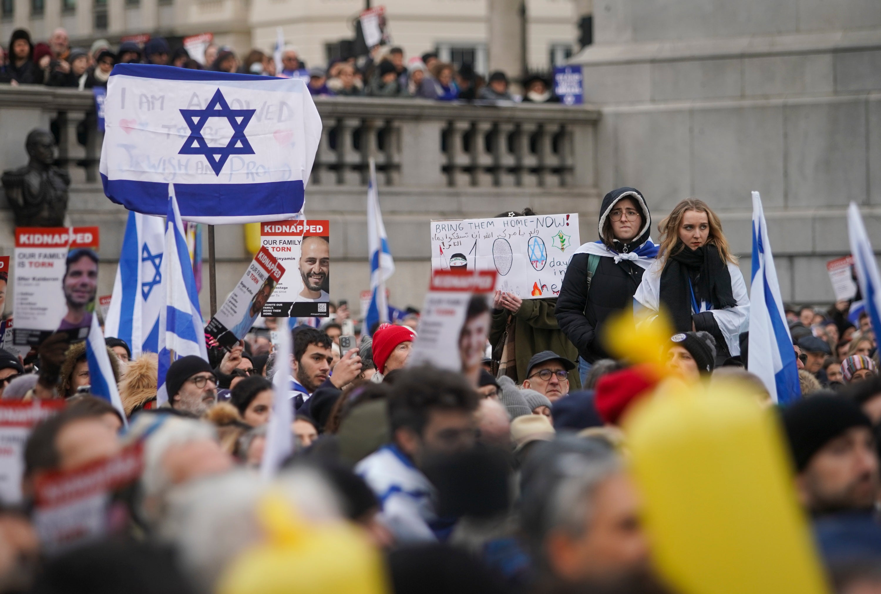 Crowds chanted ‘bring them home now’