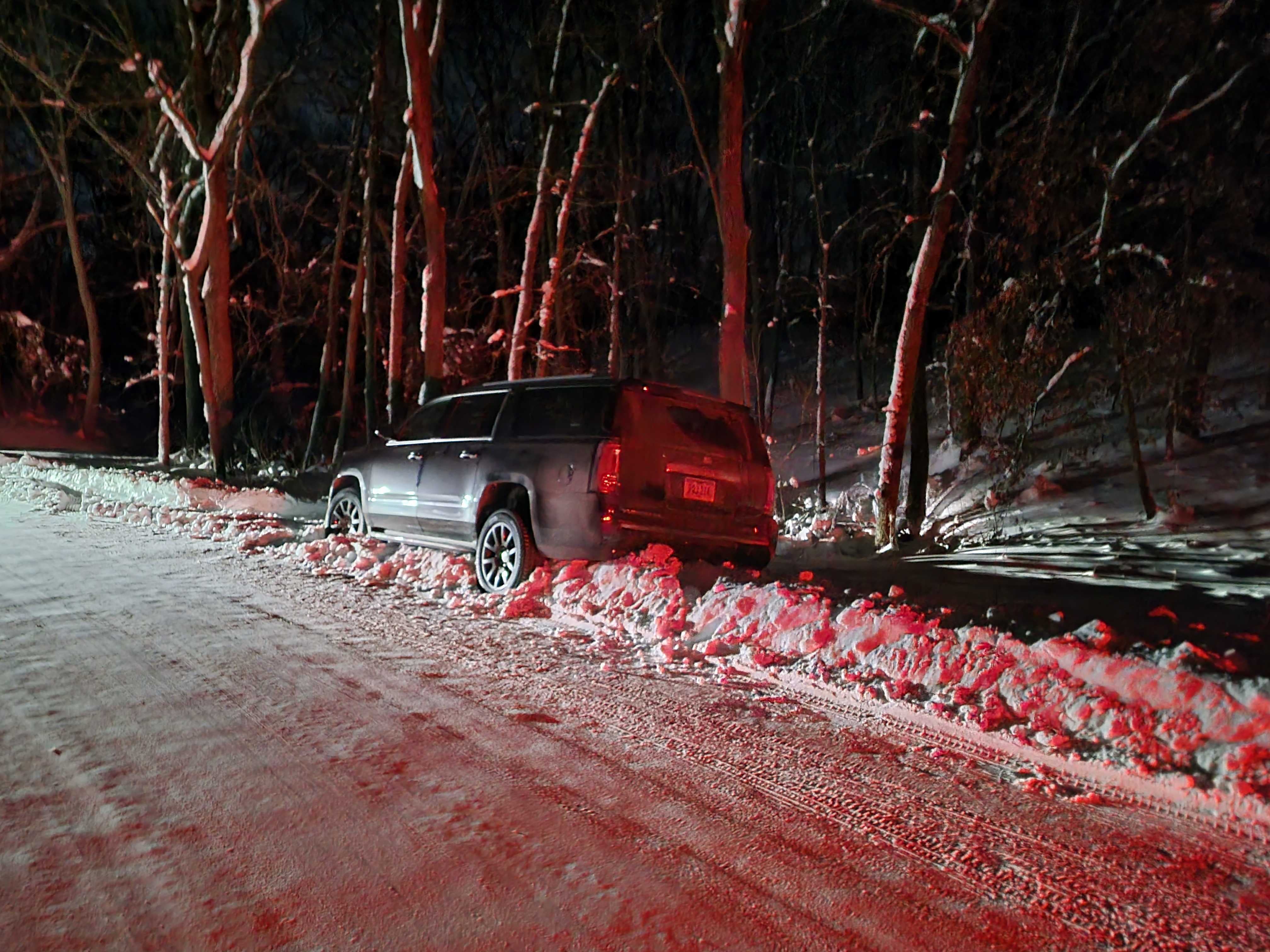 An SUV is abandoned outside of Nikki Haley’s event in Adel, Iowa after the driver was unable to move out of the snowbank