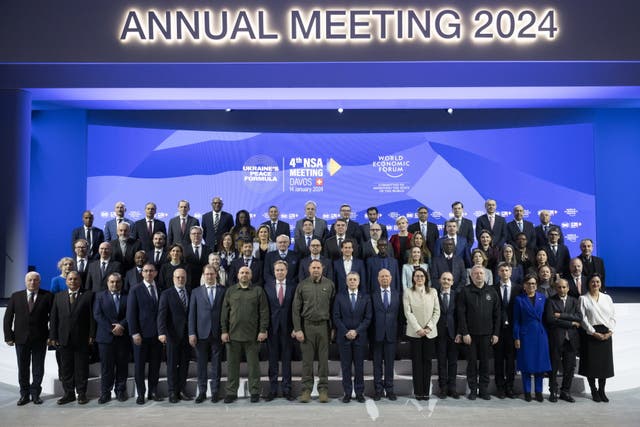 <p>Participants pose for a group picture, with Borge Brende, president WEF (8L), Andriy Yermak, Head of the Ukrainian President's Office (9L)</p>