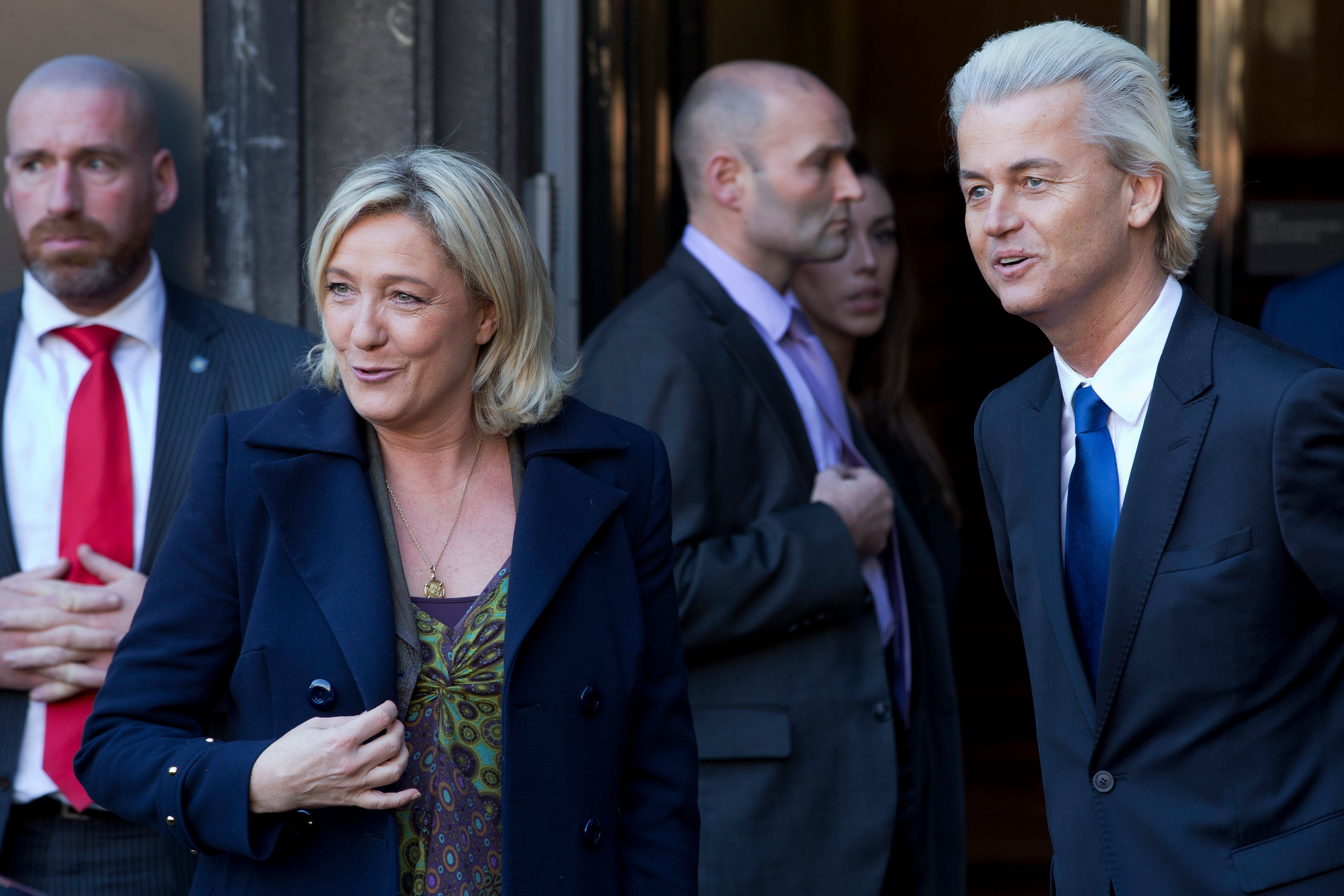 European right-wing politicians, Dutchman Geert Wilders, right, and France's Marine Le Pen, left