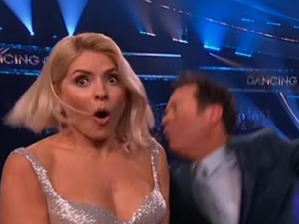 Holly Willoughby reacts to the staged punch
