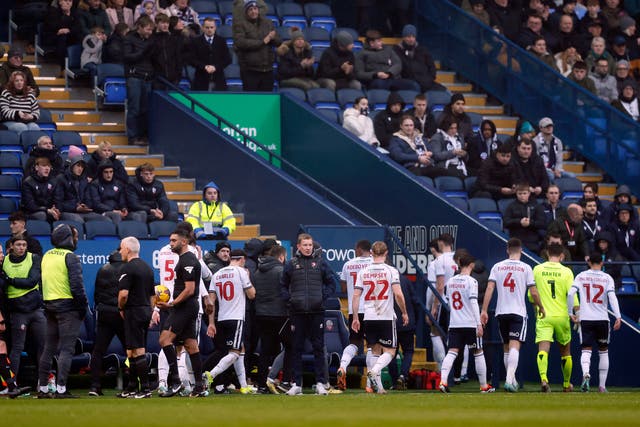 <p>The game between Bolton and Cheltenham was called off after the supporter collapsed and needed medical help</p>