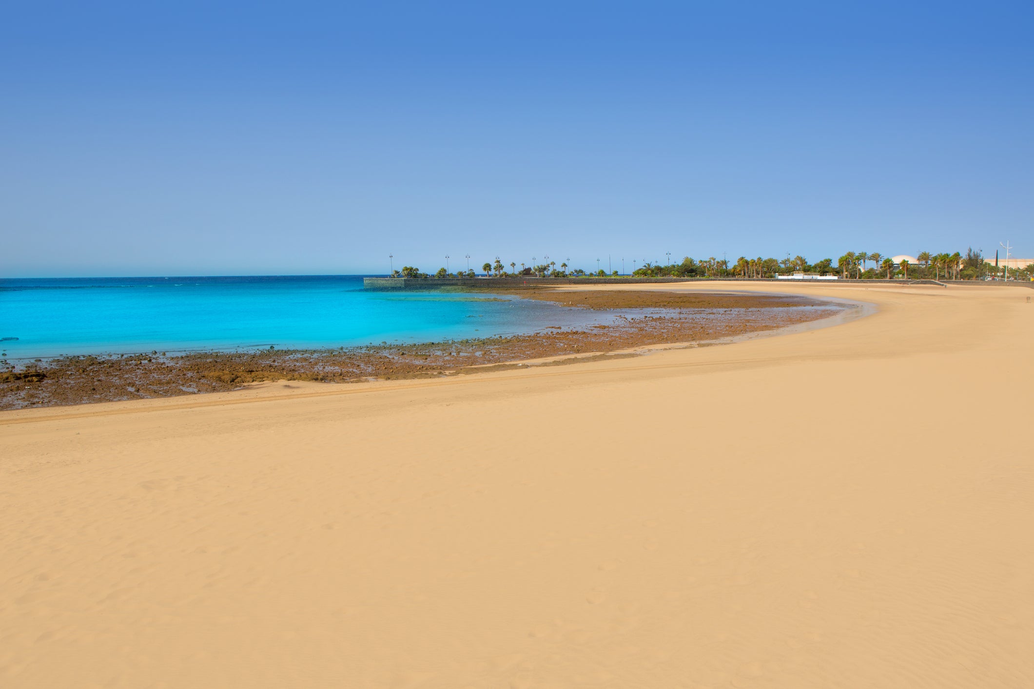 Playa del Reducto features turquoise waters and the Blue Flag status to match