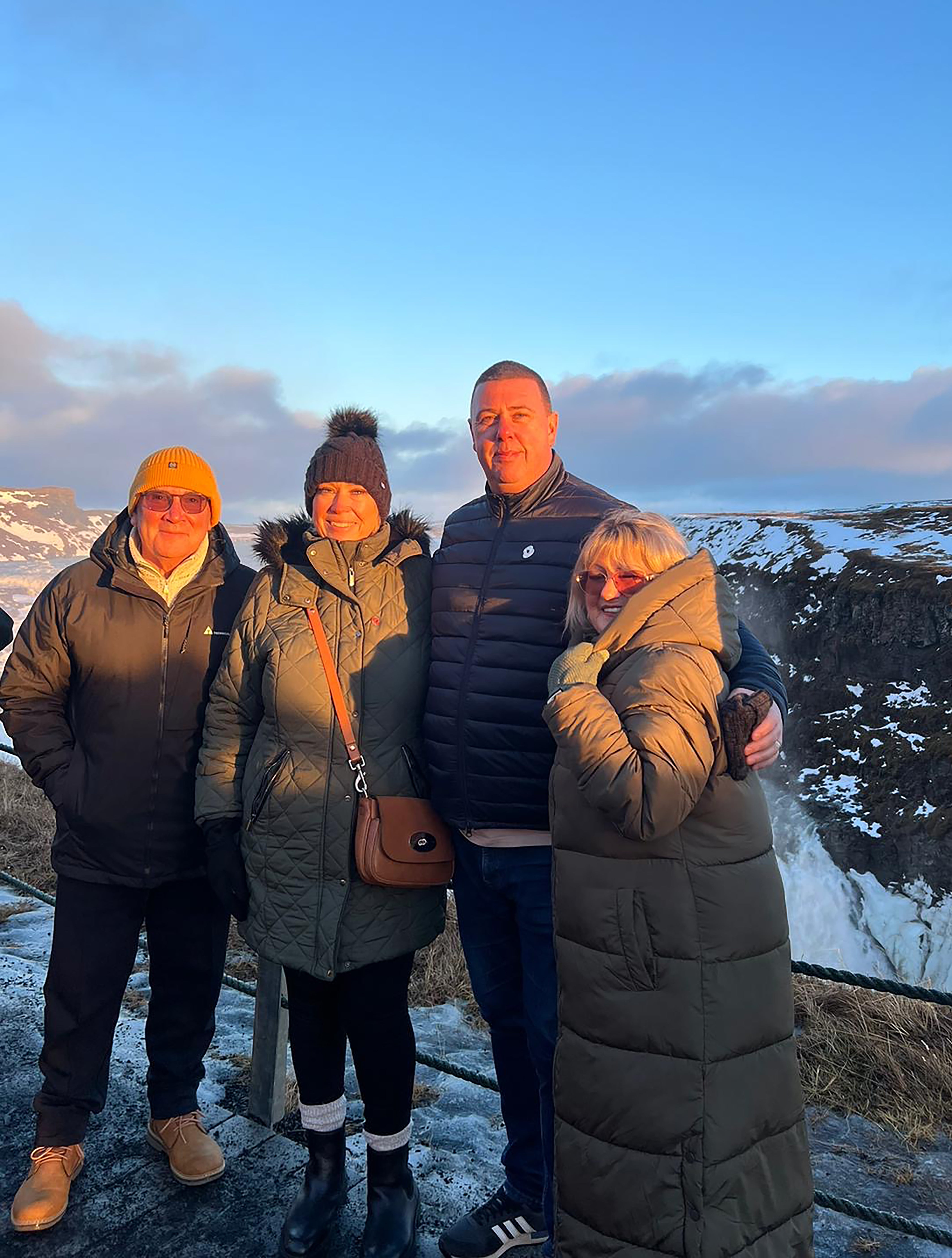 Lorraine Crawford (right) of herself with her husband John Crawford (left) and John’s cousin Michael Daltrey and Faye Daltrey saw the eruption on their way home to the airport