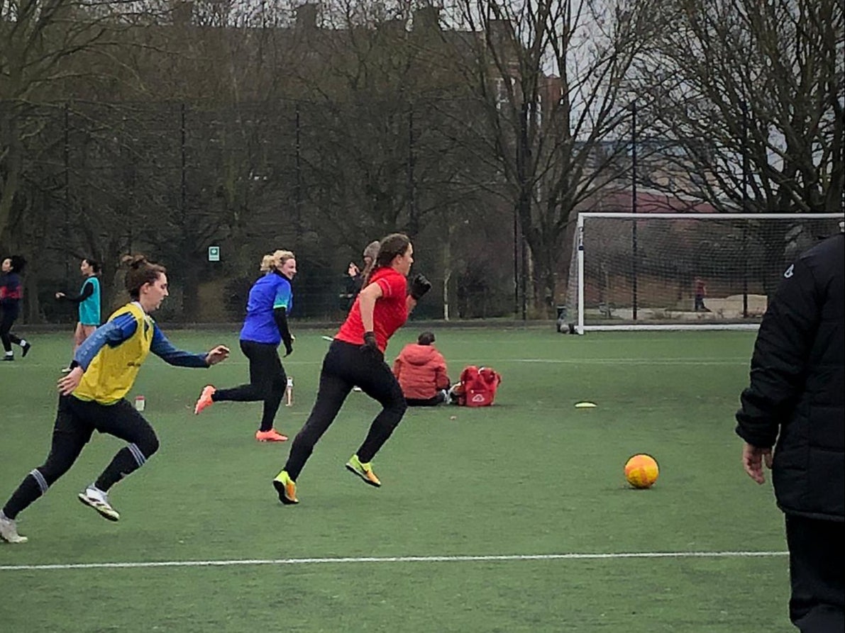 Mia Keating (in red), recently returned to playing football for the first time in 16 years
