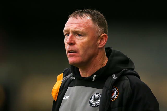 Newport manager Graham Coughlan grew up as a Manchester United supporter and could now play them in the FA Cup (Barrington Coombs/PA)