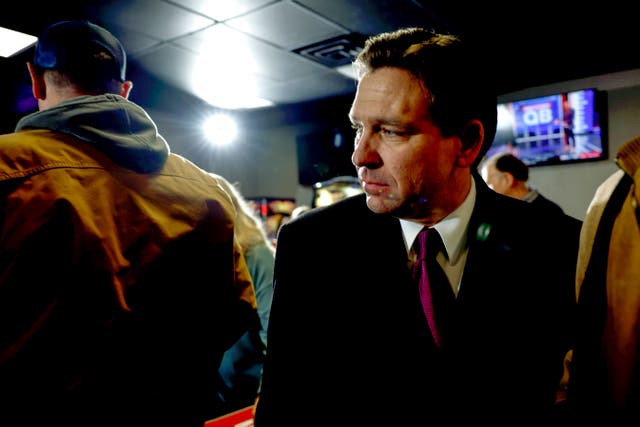 <p>Republican presidential candidate Florida Governor Ron DeSantis greets attendees after speaking at a campaign stop at Pub 52 on January 15, 2024 in Sergeant Bluff, Iowa</p>