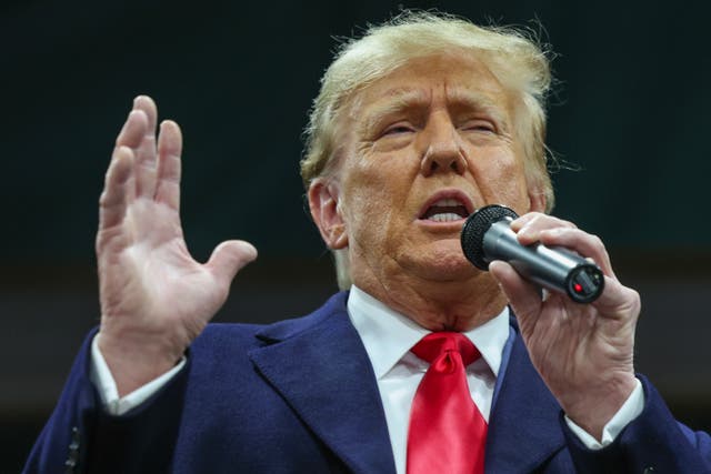 <p>Former president Donald Trump speaks to voters during a visit to a caucus site at the Horizon Event Center on January 15, 2024 in Clive, Iowa</p>