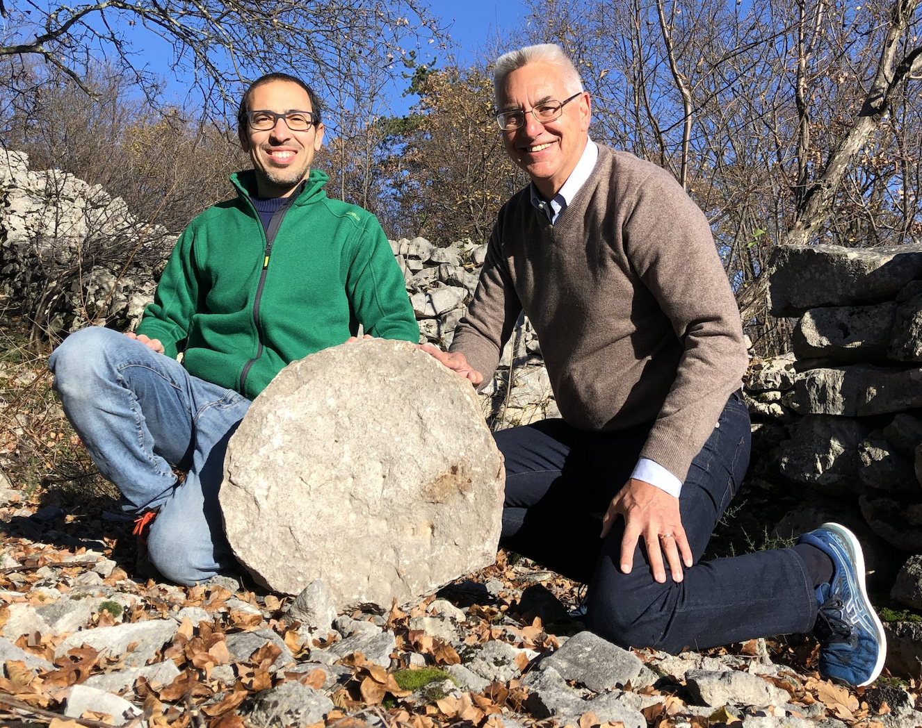 From the left, the archaeologist Federico Bernardini and the astronomer Paolo Molaro at the Castelliere di Rupinpiccolo, with what could be the oldest celestial map ever discovered