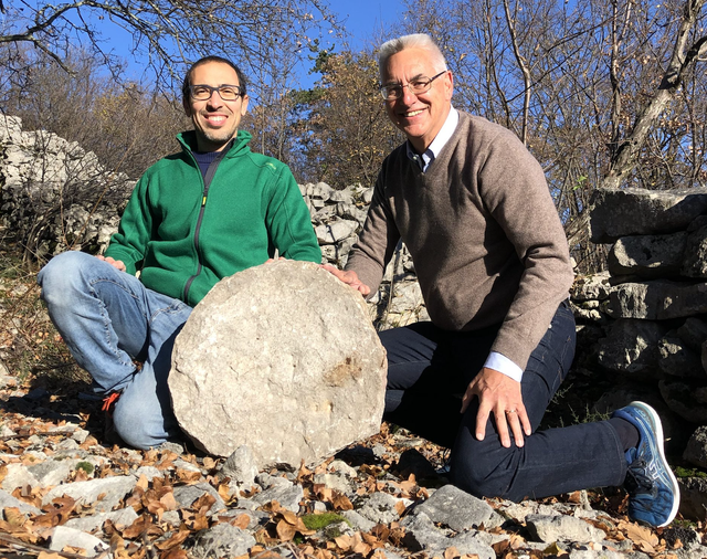 <p>From the left, the archaeologist Federico Bernardini and the astronomer Paolo Molaro at the Castelliere di Rupinpiccolo, with what could be the oldest celestial map ever discovered</p>