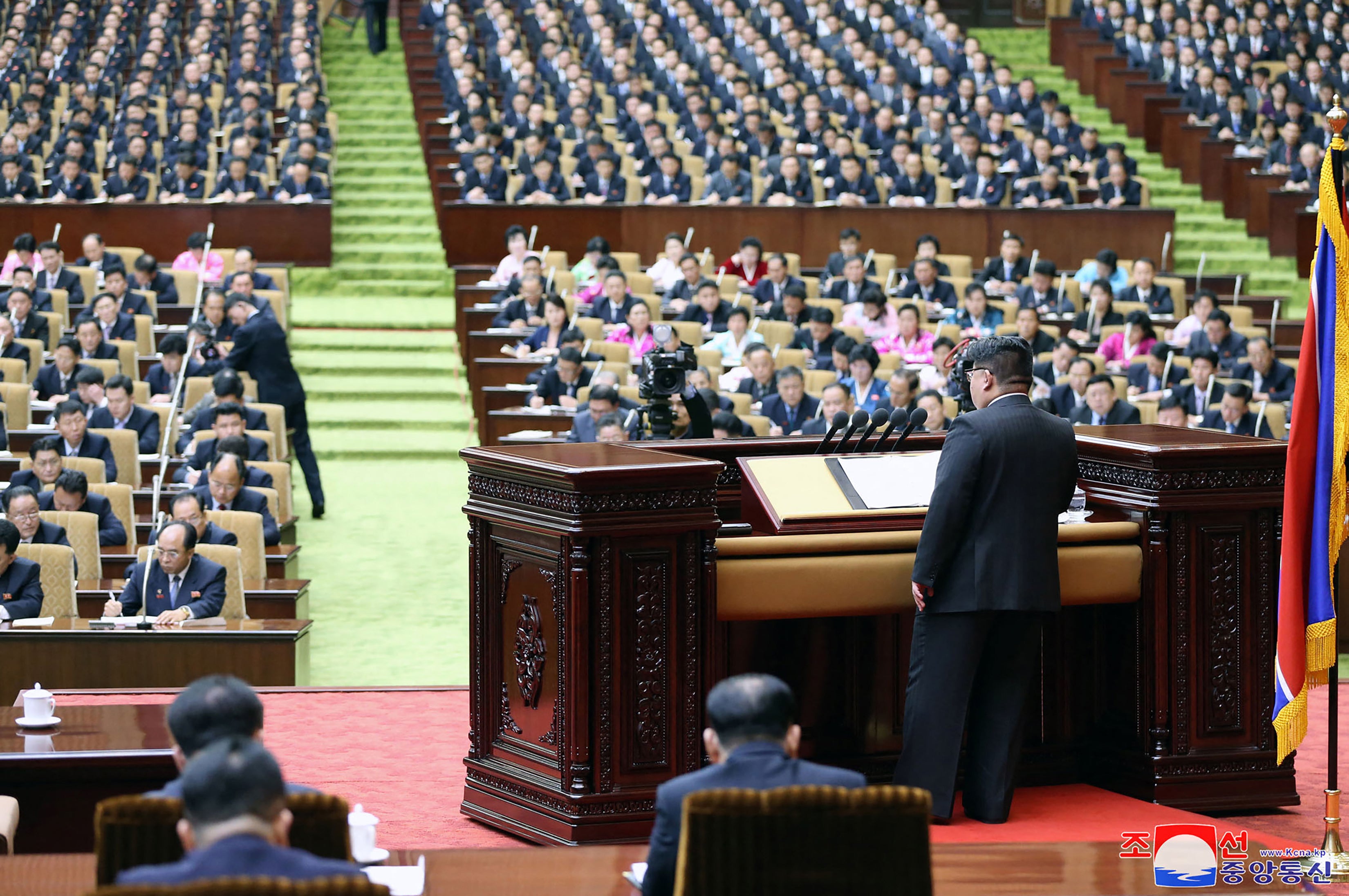 Kim before the 14th session of the assembly