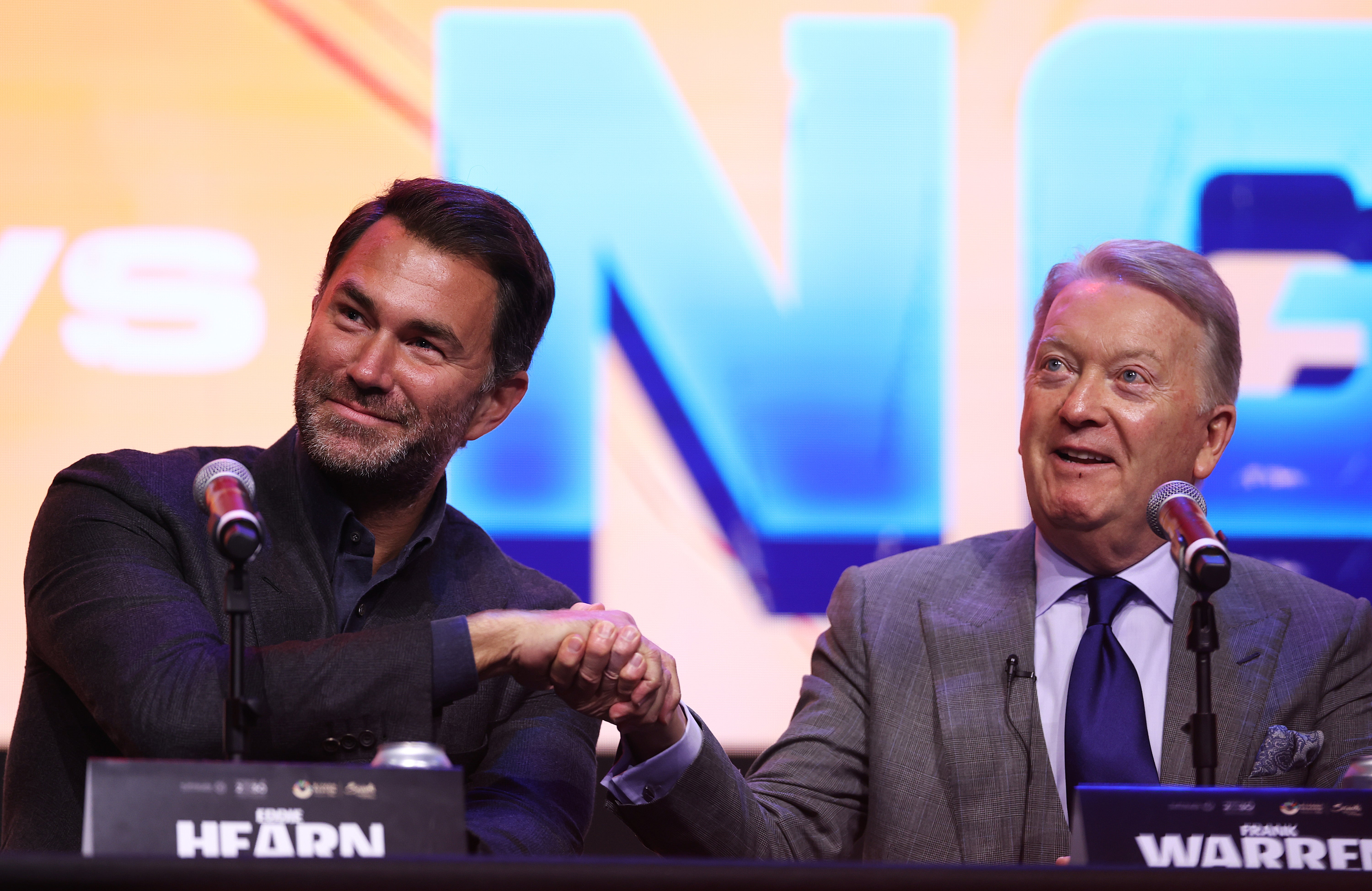 Rival promoters Eddie Hearn (left) and Frank Warren are now colleagues of sorts