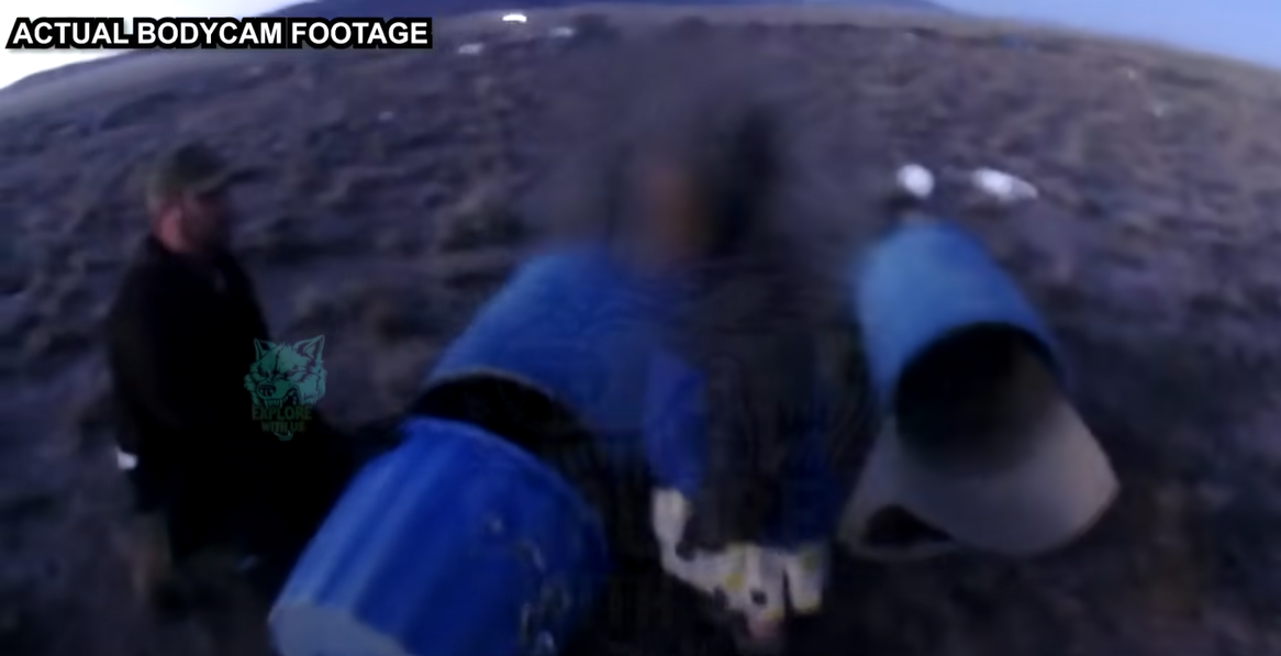The footage shows police finding the girls inside barrels in subfreezing temperatures