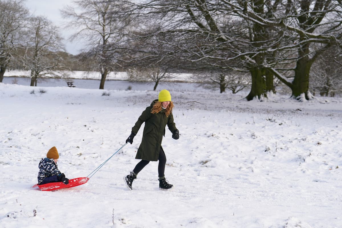 UK weather: Snow and ice warnings continue after -14C recorded in winter’s coldest night – live