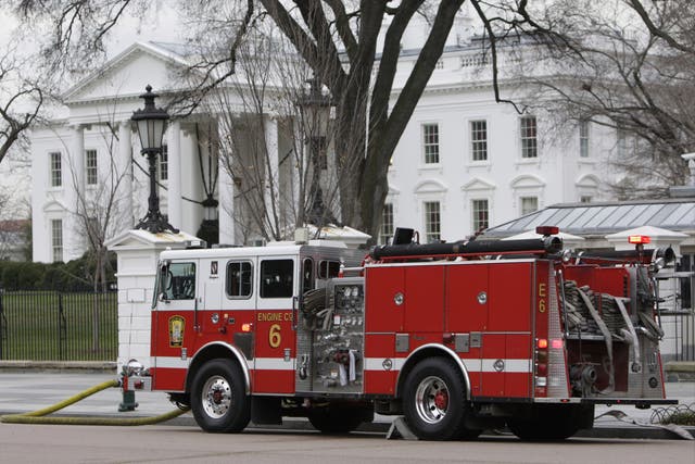 <p>A fire truck outside the White House following a reported ‘swatting' incident</p>