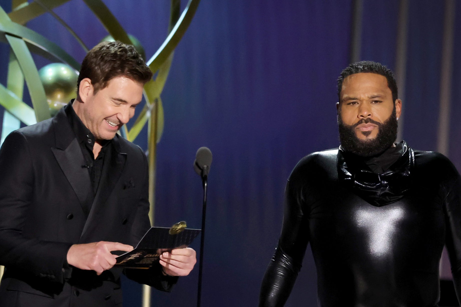 Dylan McDermott (left) and Emmys host Anthony Anderson