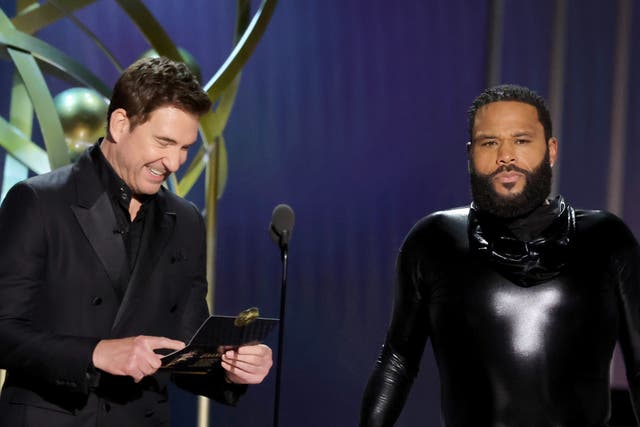 <p>Dylan McDermott and Emmys host Anthony Anderson</p>