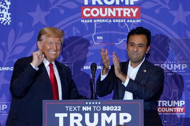 <p>US entrepreneur Vivek Ramaswamy endorses Republican presidential candidate former US president Donald Trump during a campaign event at the Atkinson Resort and Country Club in Atkinson, New Hampshire</p>