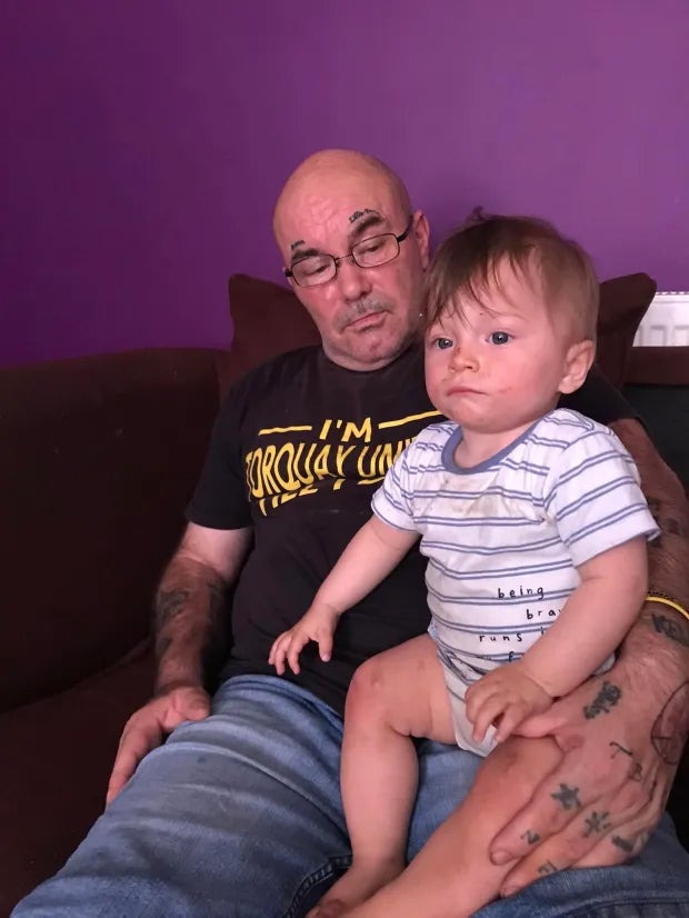 Bronson Battersby, 2, with his father Kenneth, 60, who allegedly died of a heart attack shortly after 26 December
