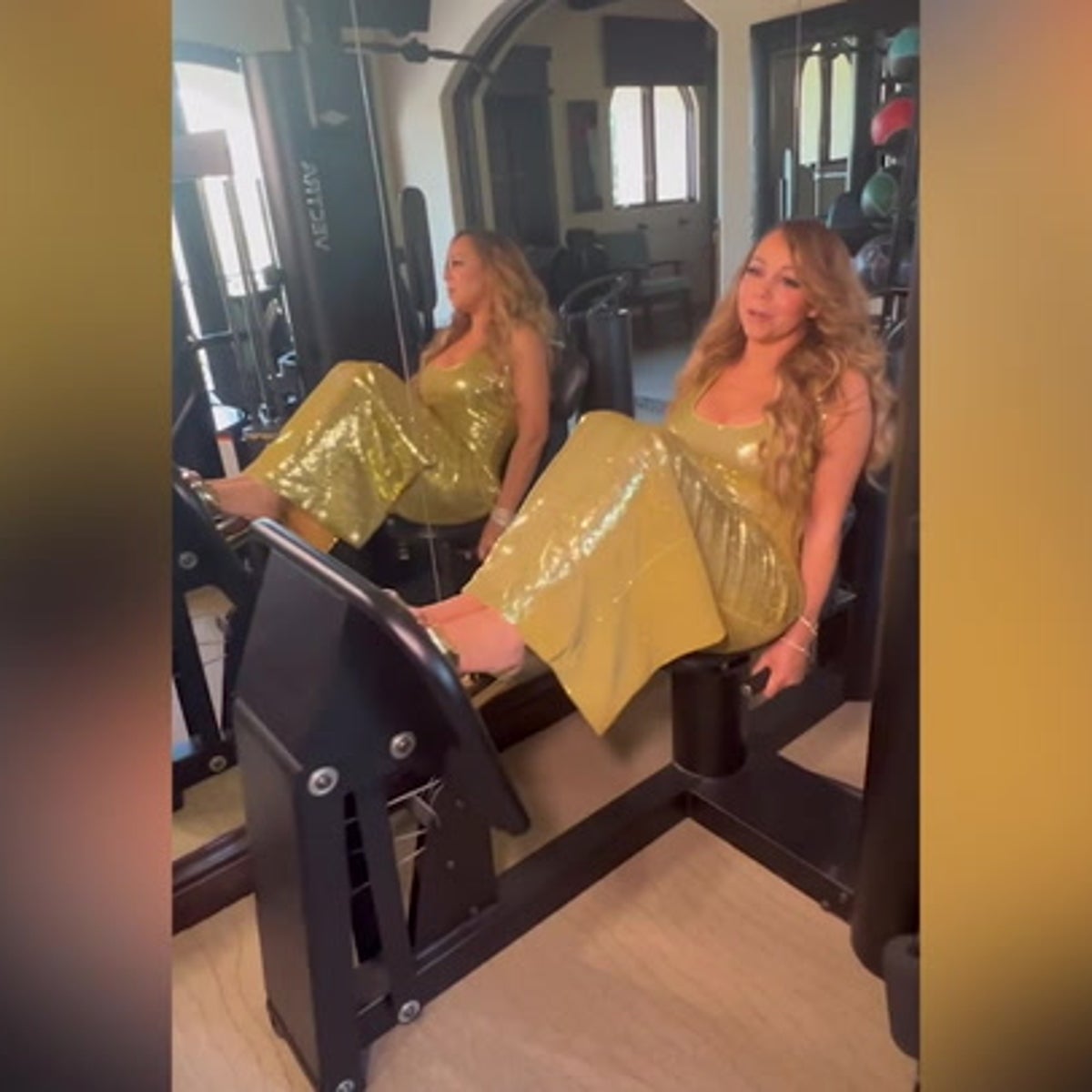 Mariah Carey does gym workout wearing gold gown and platform heels | Culture | Independent TV Mariah Carey does gym workout wearing gold gown and platform heels | Culture | Independent TV