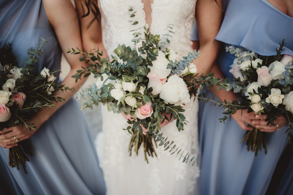 Wedding guest accidentally shows up wearing same dress as bridesmaids