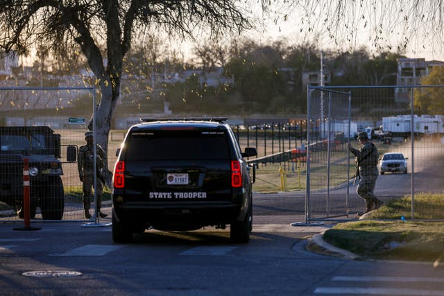 <p>Texas Department of Public Safety officers guard an entrance to Shelby Park in Eagle Pass, Texas</p>