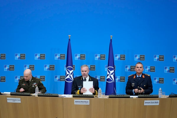 Admiral Rob Bauer (centre), General Christopher Cavoli (left), and General Chris Badia prepare to address a conference at Nato HQ in Brussels, 18 January