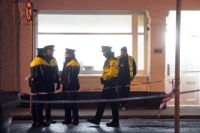 Emergency services outside the hostel on Little Britain Street (Brian Lawless/PA)