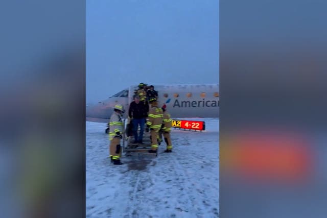 <p>Watch: American Airlines plane carrying 53 passengers skids off icy New York airport runway.</p>