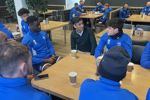 Rishi Sunak meets Eastleigh players during a visit to the Silverlake Stadium, in Eastleigh (Ben Mitchell/PA)