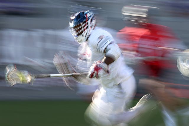 <p>Trevor Baptiste runs upfield at the World Lacrosse Championships in San Diego in 2023</p>