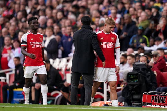 <p>Mikel Arteta, left, says Emile Smith Rowe is settled at Arsenal (John Walton/PA)</p>