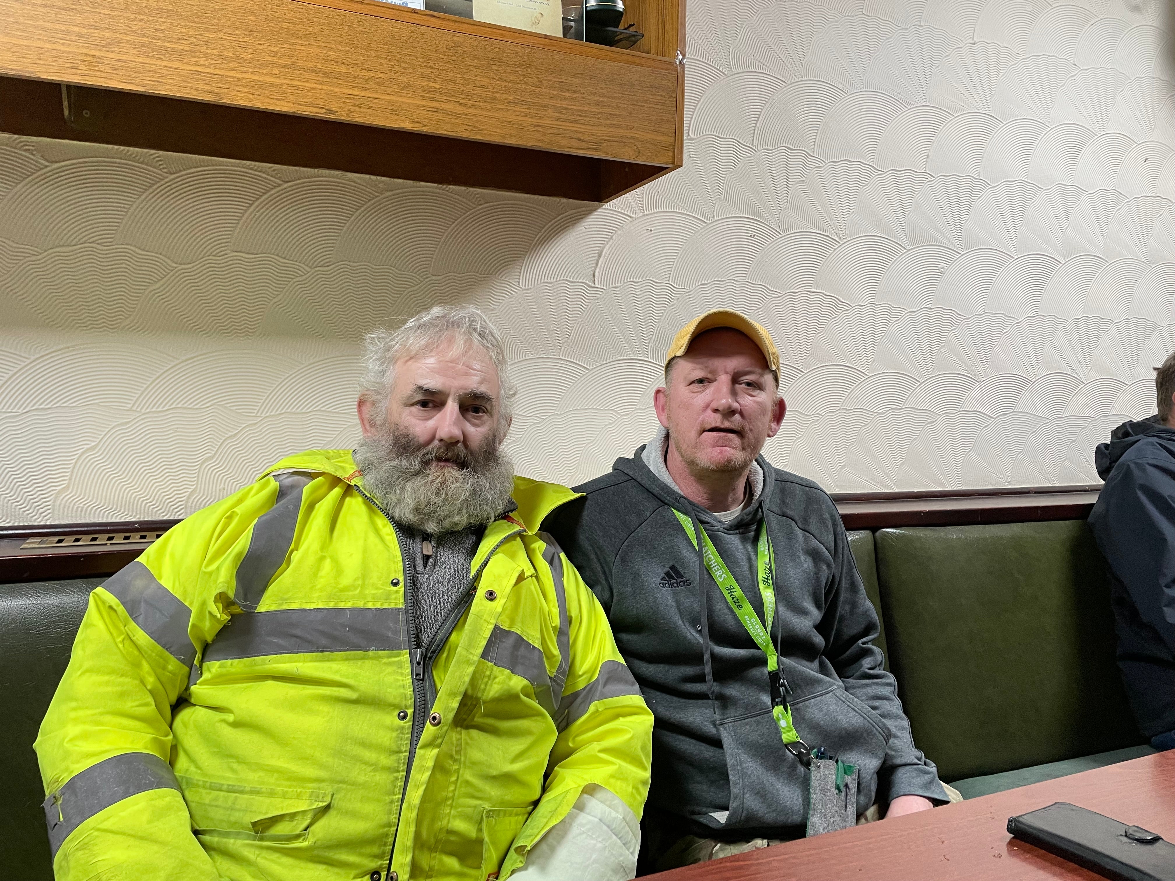 Anthony Andrews (left) and Gary English both worked at the Tata steelworks in Port Talbot - on Friday they were among drinkers discussing the partial closure in the Seaside and Social Club
