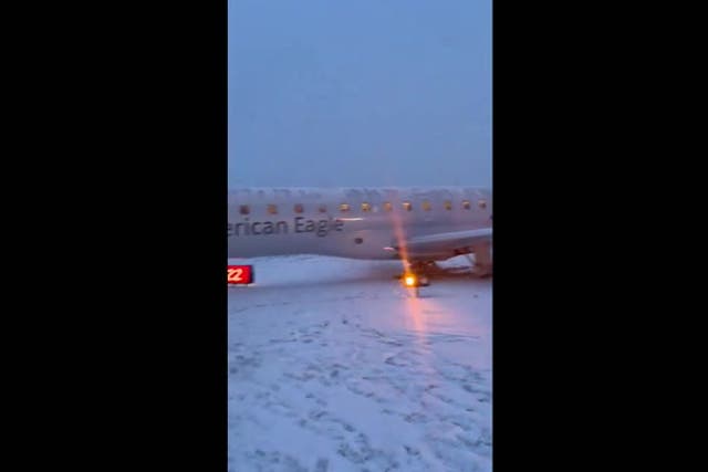 <p>American plane slides off Rochester runway as snowstorm hits New York</p>
