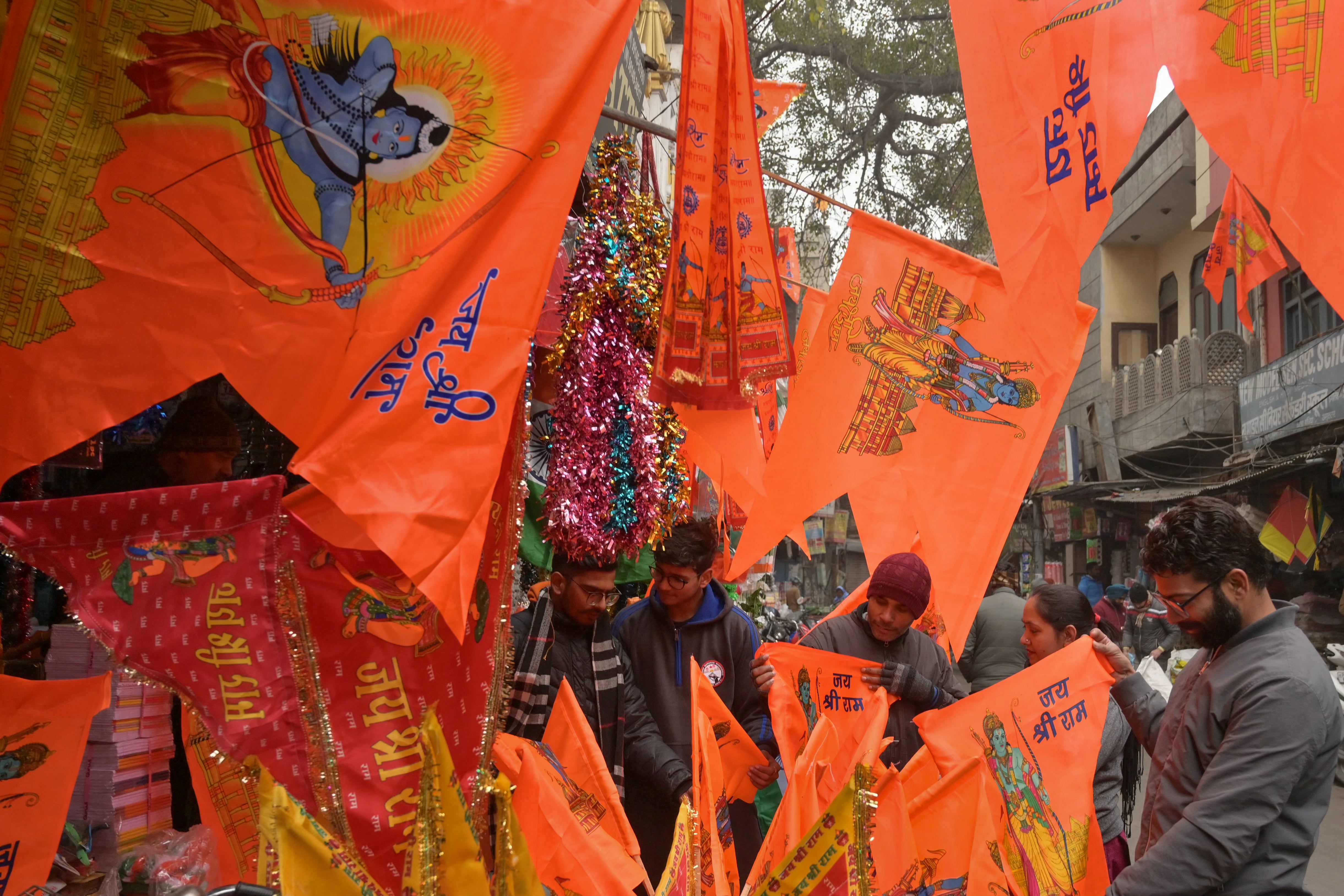 People buy flags with pictures of Lord Ram and the Ram Temple from a shop in Amritsar last week