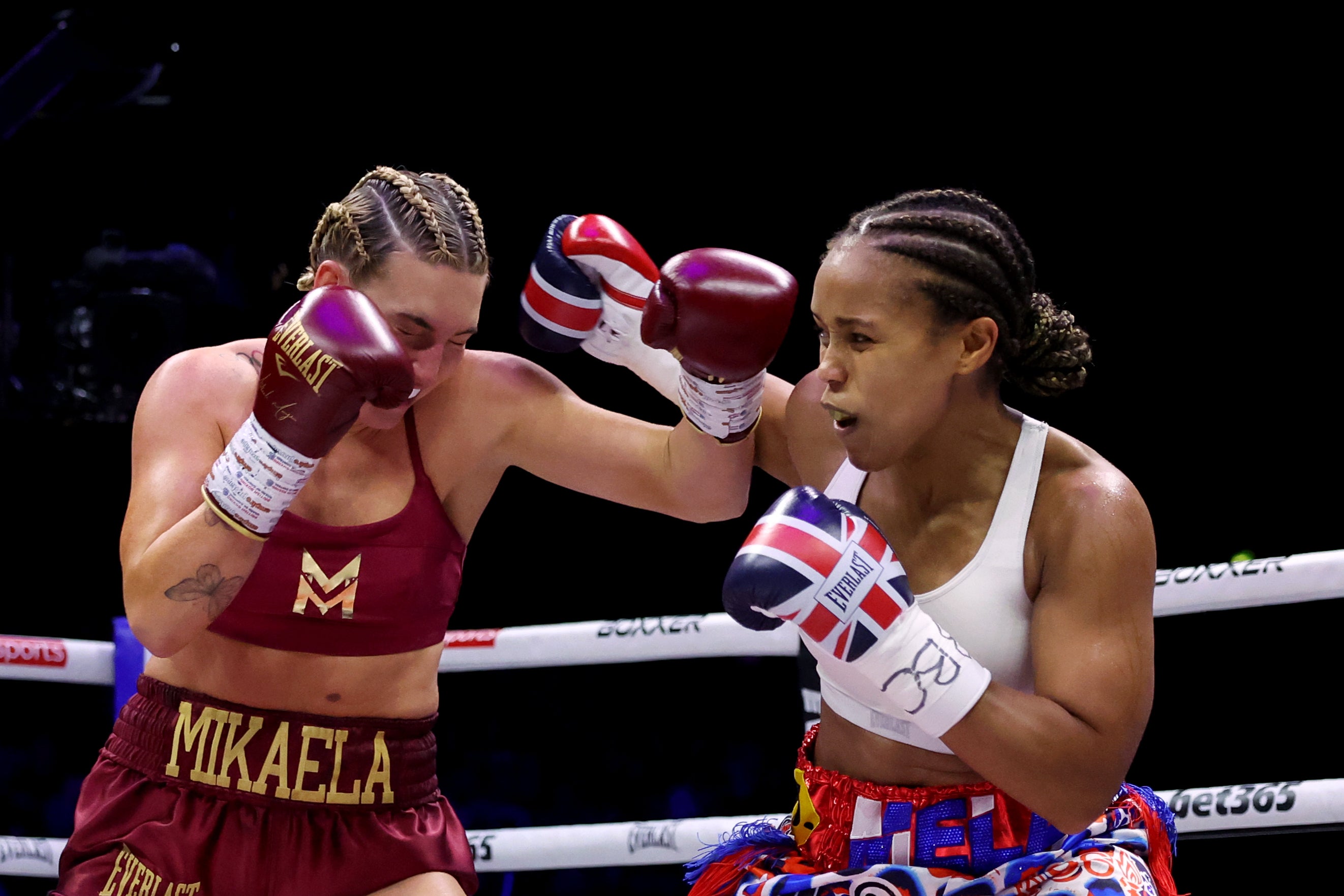 Mikaela Mayer (left) and Natasha Jonas in action