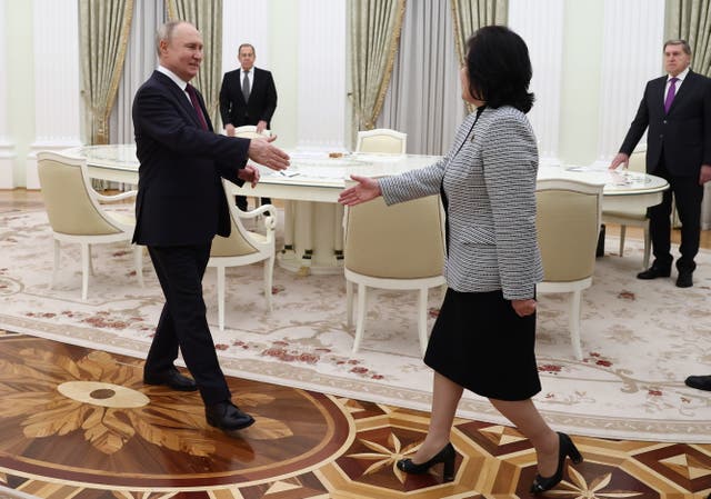 <p>Russian president Vladimir Putin (L) welcomes North Korean foreign minister Choe Son Hui (C) during their meeting in the Moscow Kremlin, Russia, 16 January 2024</p>