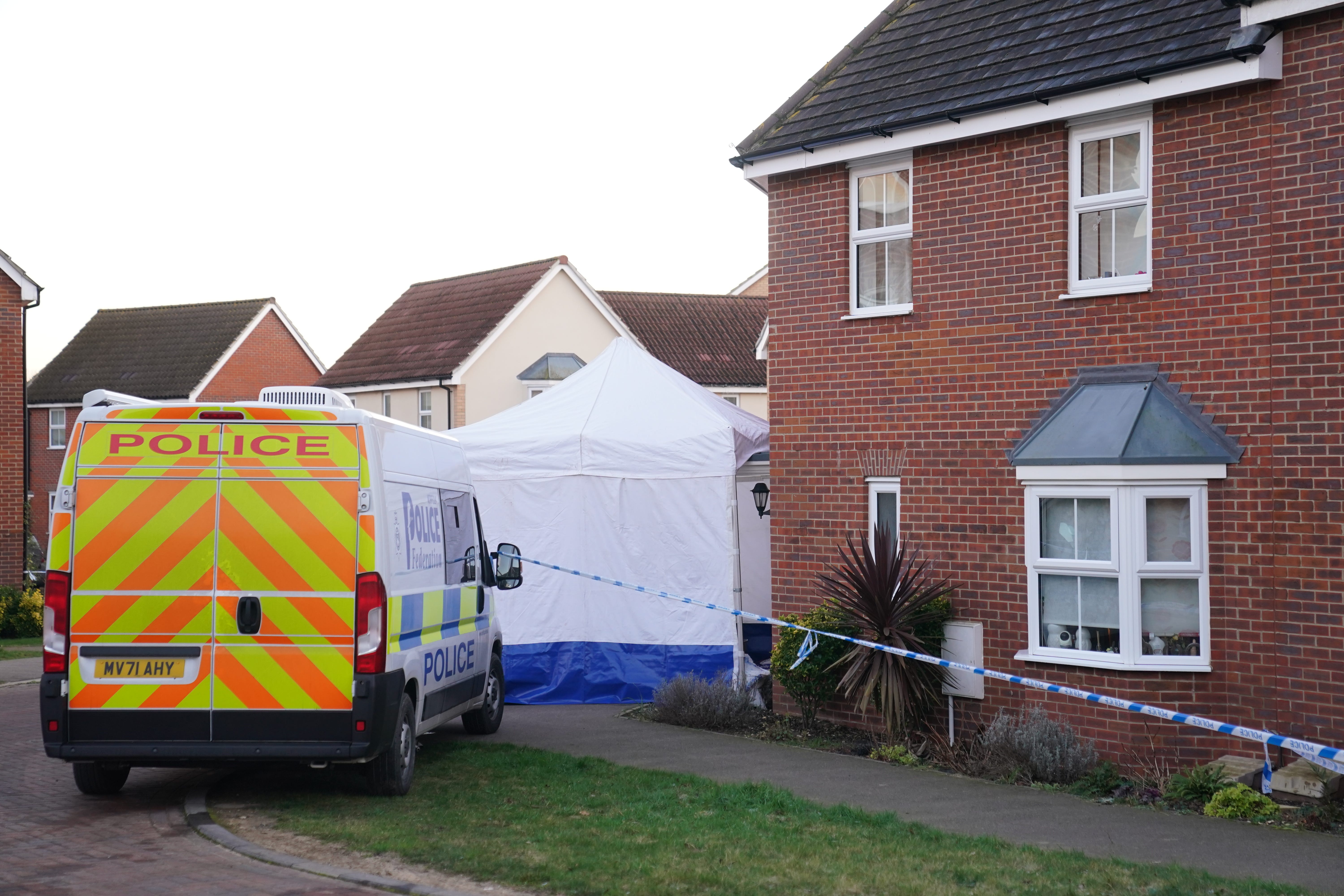 Police outside a house in Costessey near Norwich (Joe Giddens/PA)