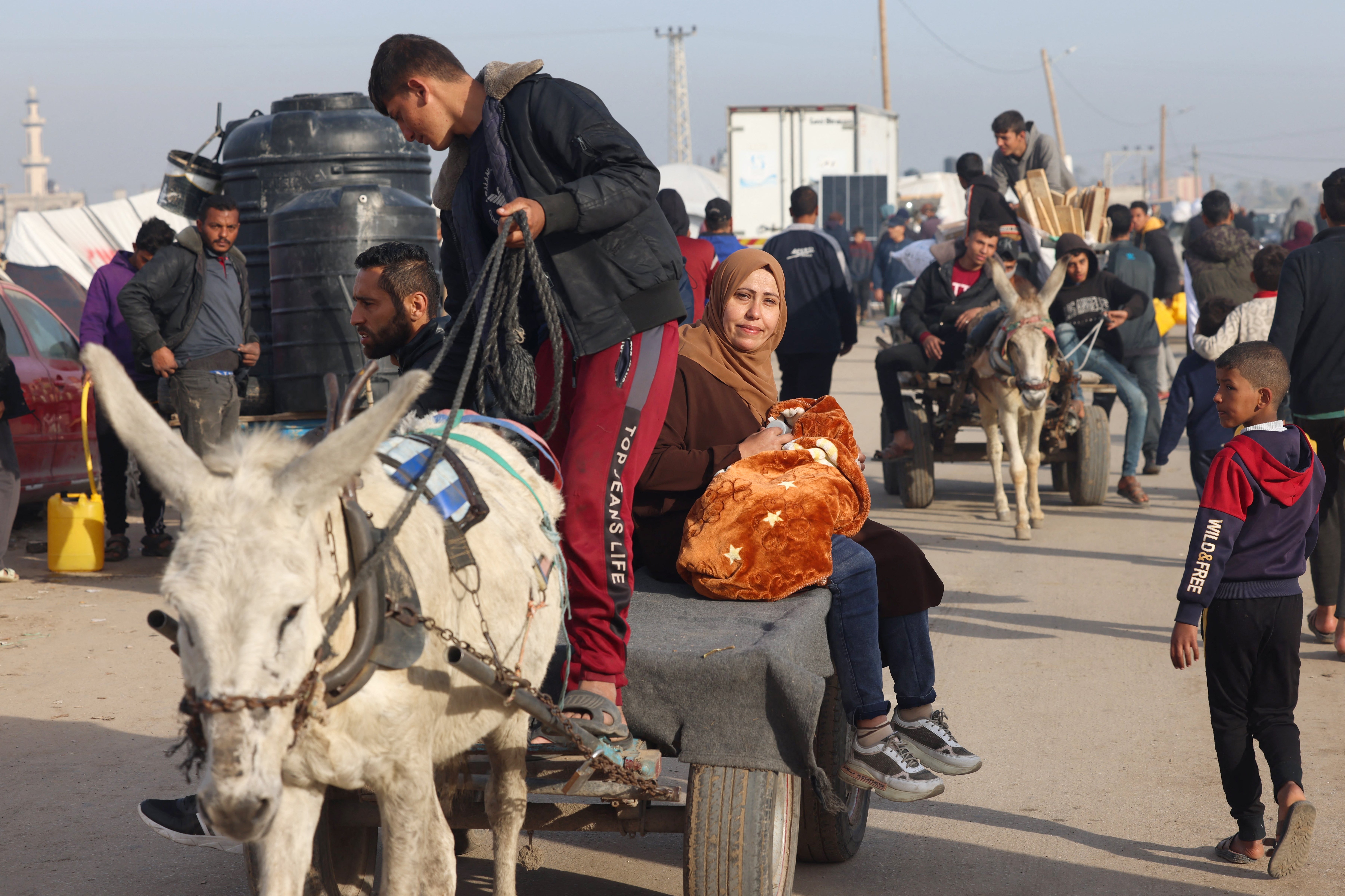 Palestinians on the move near Rafah on Sunday in the south of the strip