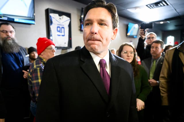 <p>Republican presidential hopeful and Florida Gov. Ron DeSantis walks through a room of supporters at a caucus-day campaign event Monday, Jan. 15, 2024, at Pub 52 in Sergeant Bluff, Iowa</p>