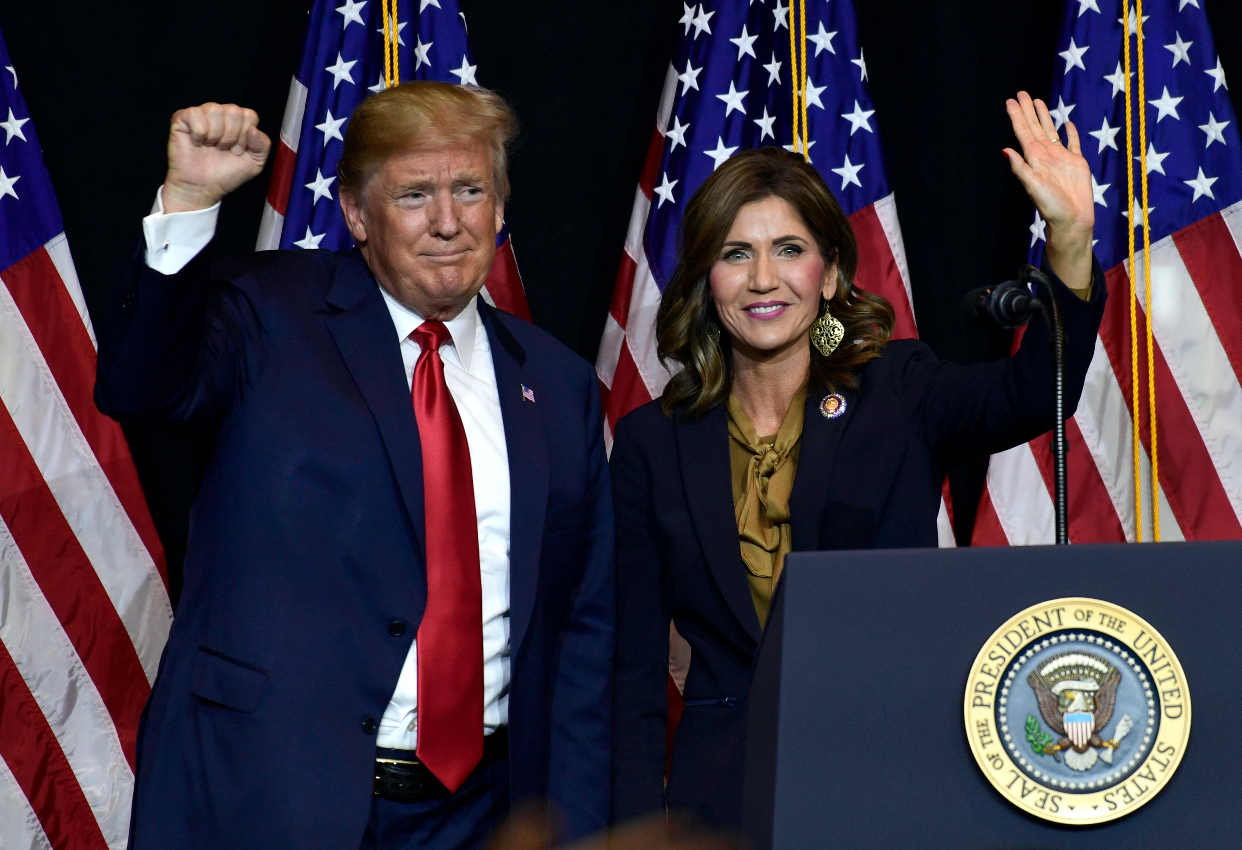 Donald Trump appears with South Dakota Goveornor Kristi Noem in 2018