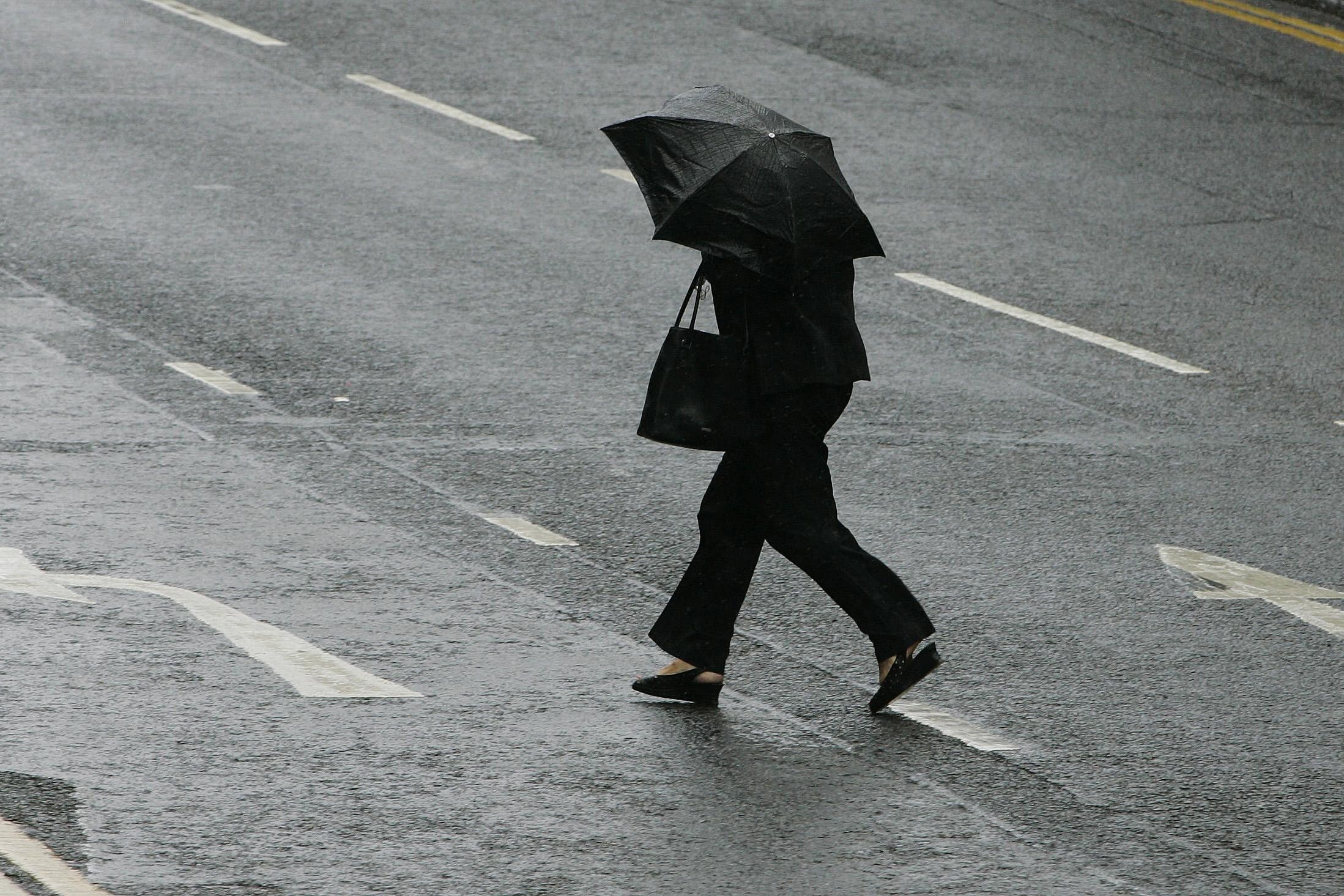 Travel disruption is continuing after amber and red warnings at the height of Storm Isha, with all ScotRail trains suspended until after the morning rush-hour (Andrew Milligan/PA)