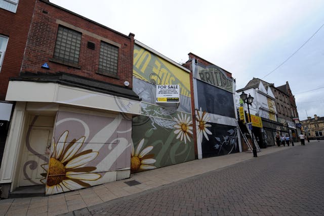 Boarded up shops in Rotherham as it was revealed that thousands of firms have started 2024 in critical financial distress (John Giles/PA)