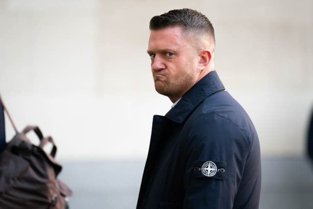 <p>Tommy Robinson, whose real name is Stephen Yaxley Lennon, arriving at Westminster Magistrates' Court</p>