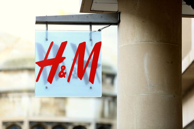 Fashion giant H&M has pulled an ad for school uniforms after it was accused of sexualising young children (Chris Radburn/PA)