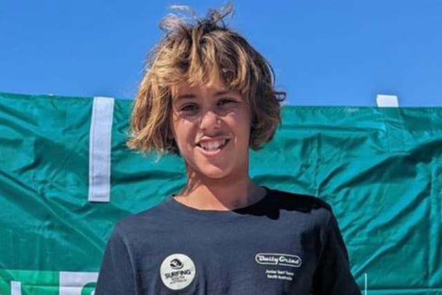 <p>Hundreds of mourners have gathered at the favourite beach of a 15-year-old surfer who was killed in a horror shark attack</p>