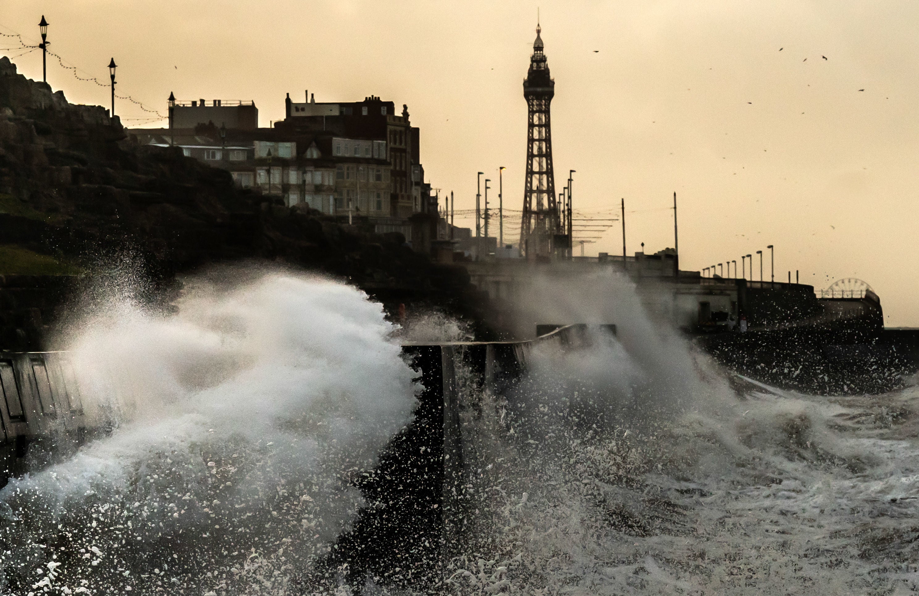 Waves break on the sea front in Blackpool