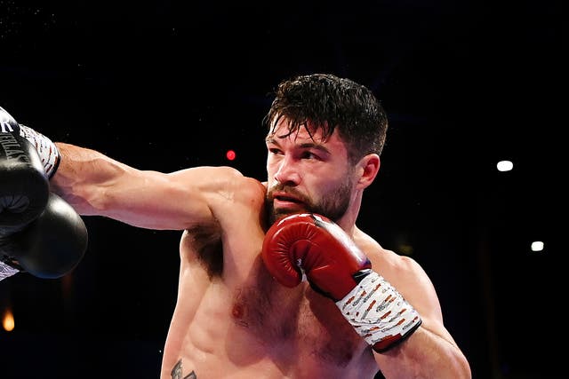 <p>John Ryder during his victory over Daniel Jacobs in 2022</p>