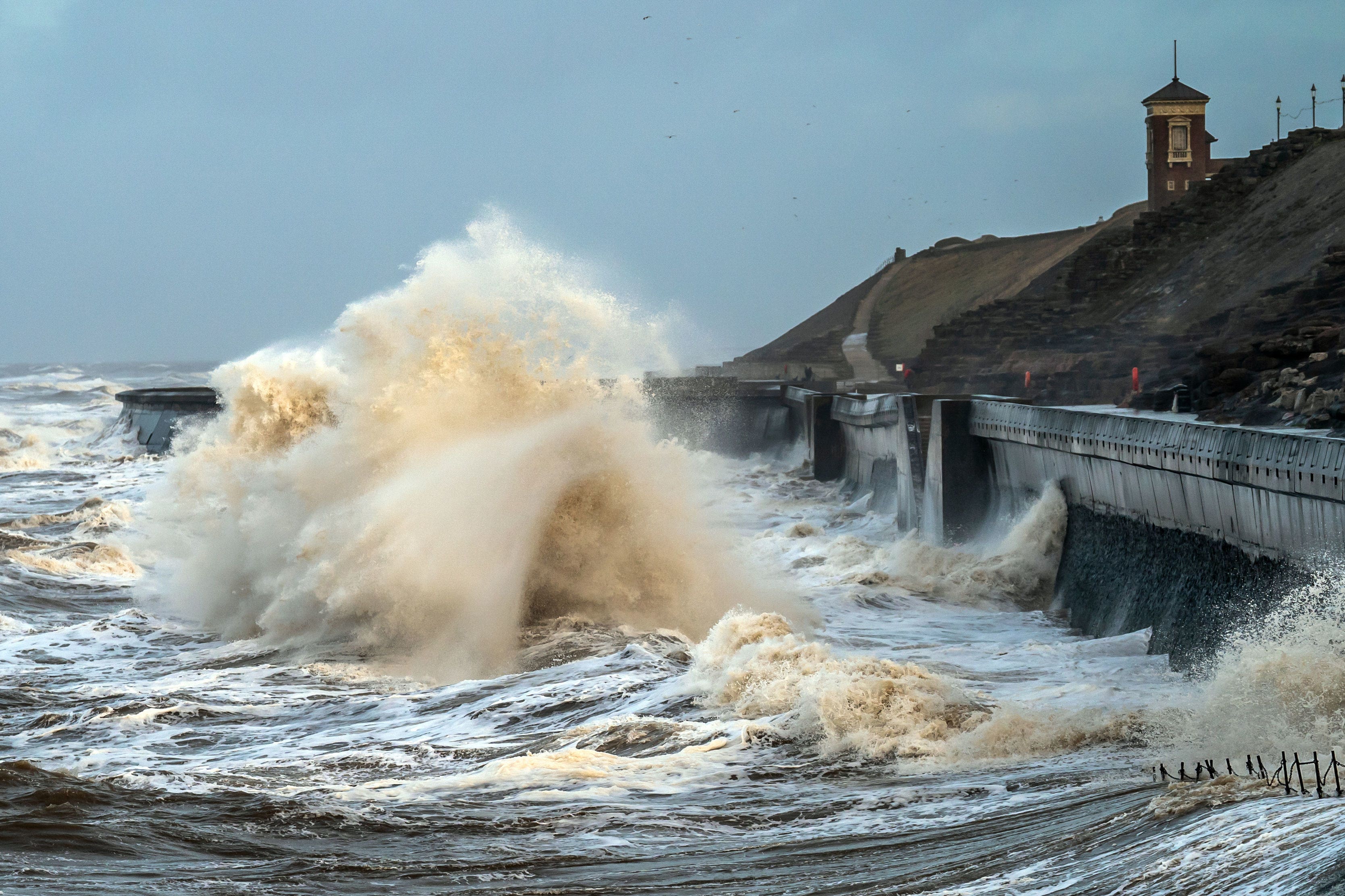 Waves break on the seafront in Blackpool during high winds ushered in by Storm Isha (Danny Lawson/PA)