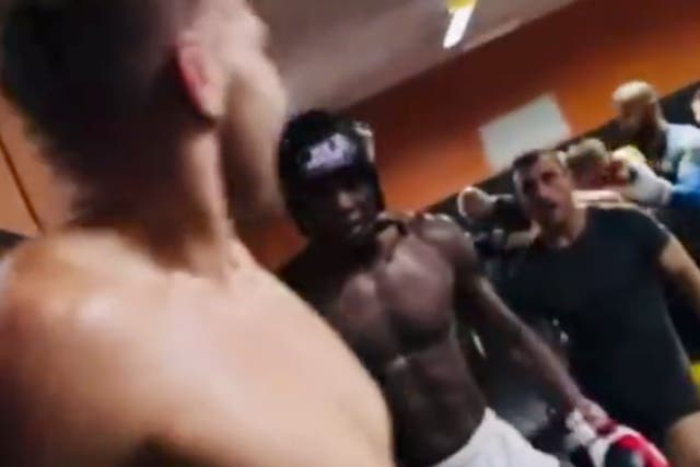 <p>Israel Adesanya (centre) accidentally interrupted a sparring session involving Dricus Du Plessis (left)</p>
